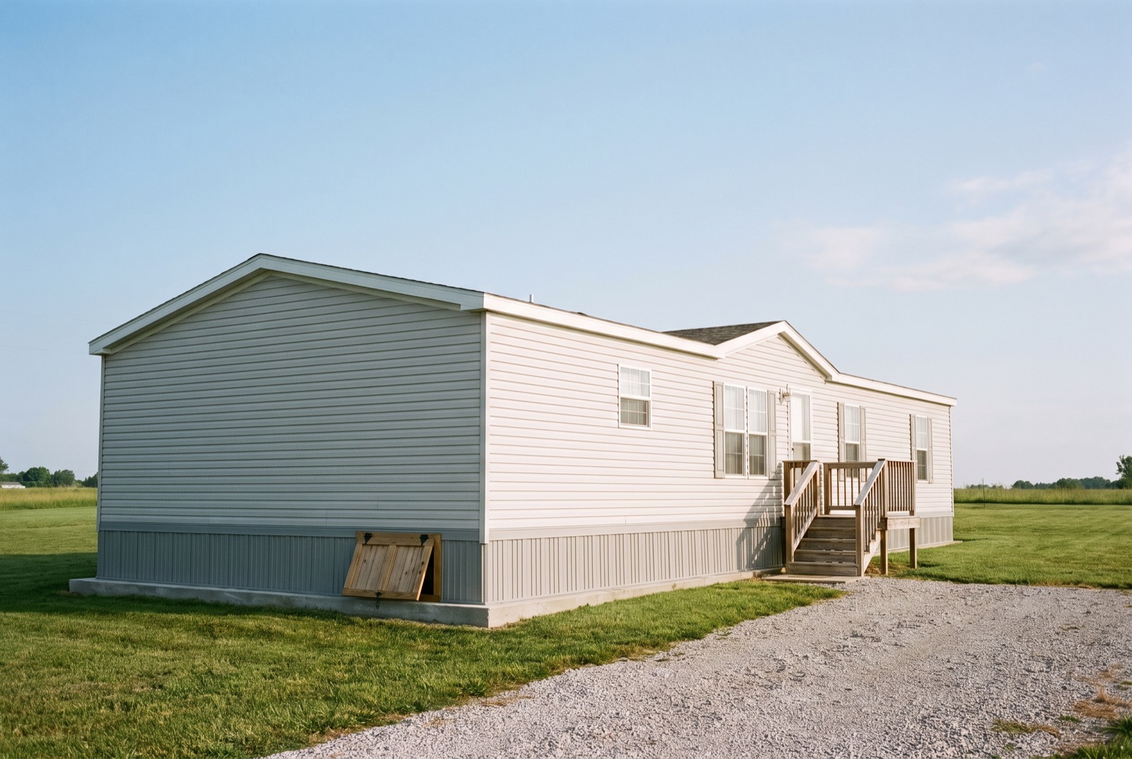 A manufactured home on a permanent foundation with skirting